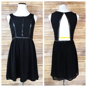 Lulu's Black Open Back Faux Leather Trim Dress